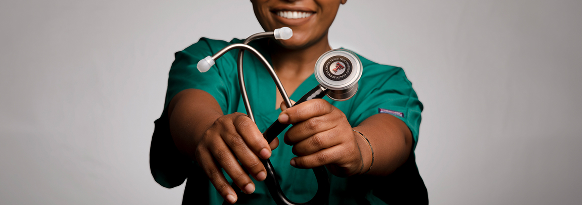 TTUHSC student holding up their stethoscope